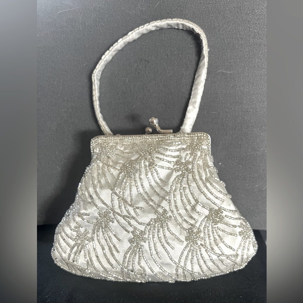 Beaded white satin hand purse.  Never used. Perfect for that special night out.